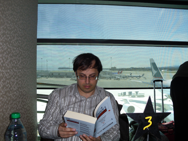 Me reading The Founder's Dilemmas waiting for a plane in SFO